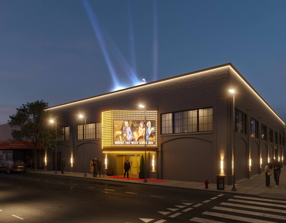 Exterior rendering of 895 O'Farrell at night, marquee lit with searchlights